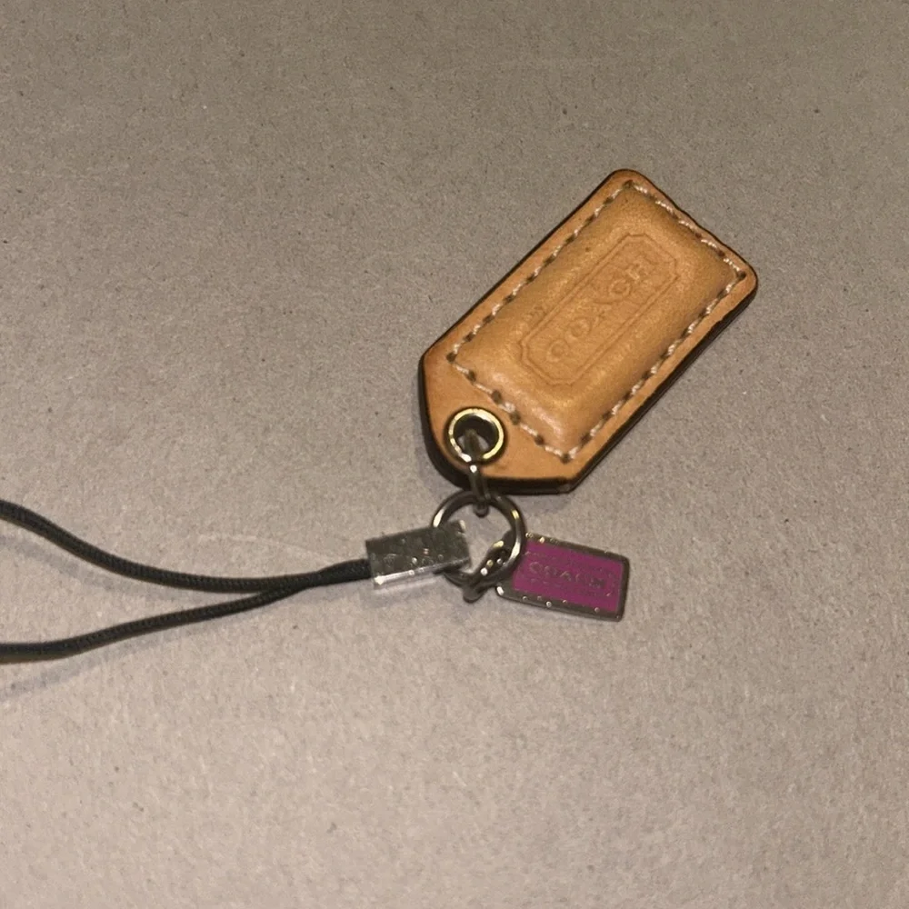 Coach bag tag